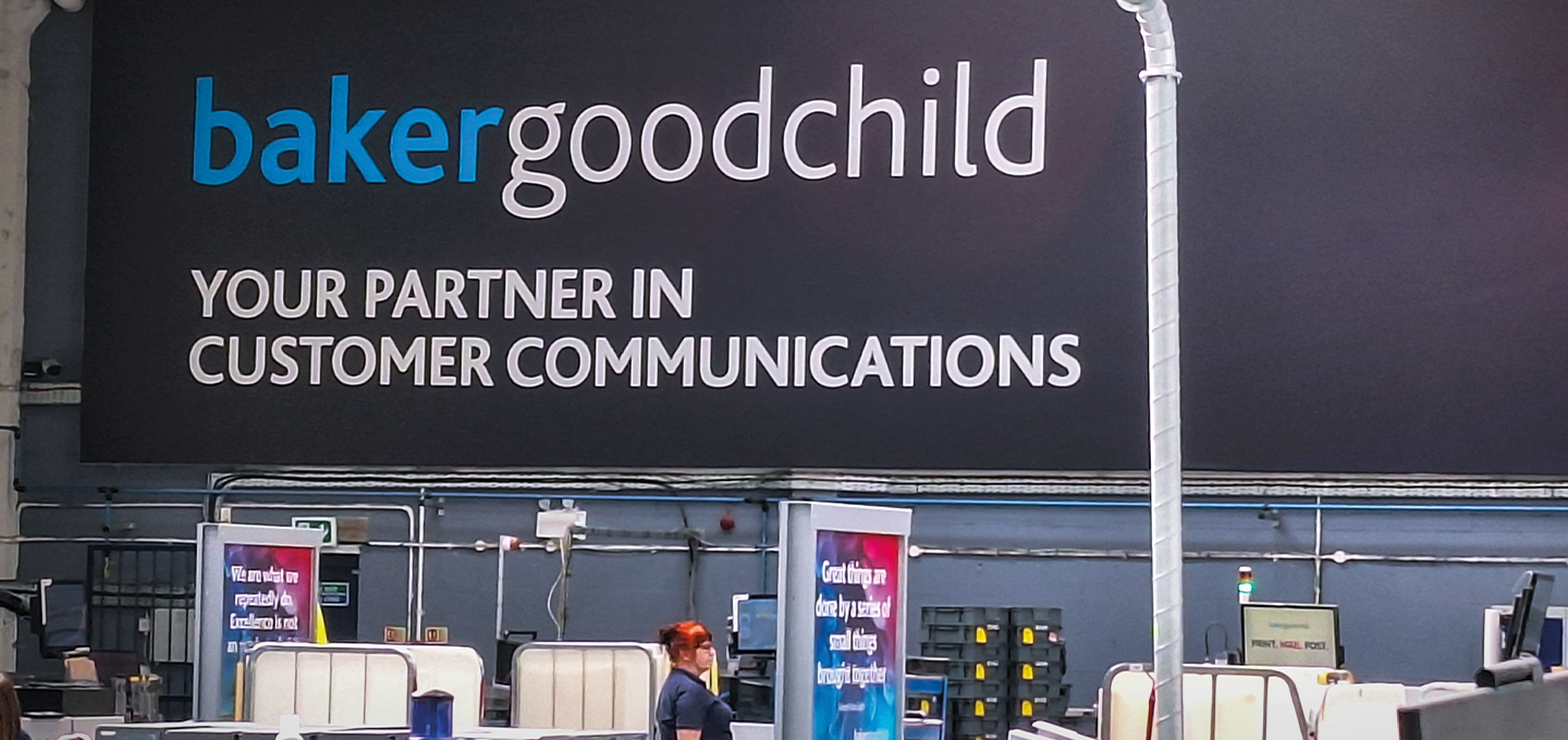 A sign with white text